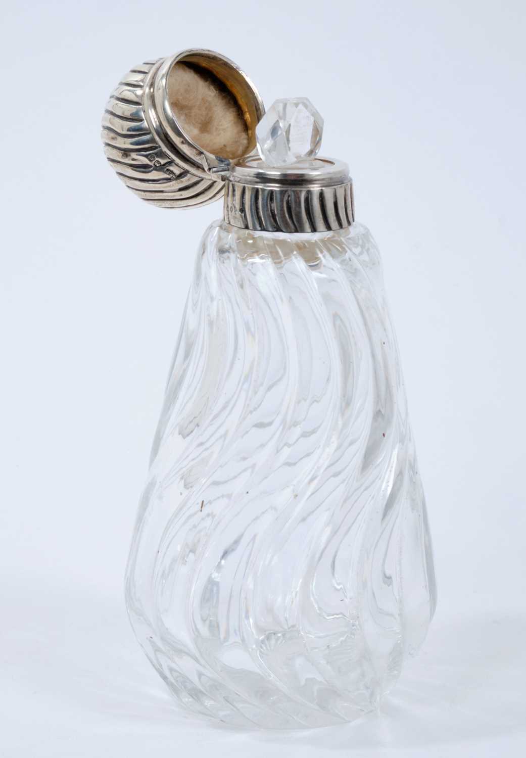 Victorian wrythen pattern cut glass toilet bottle of conical form with silver hinged cover - Image 2 of 2