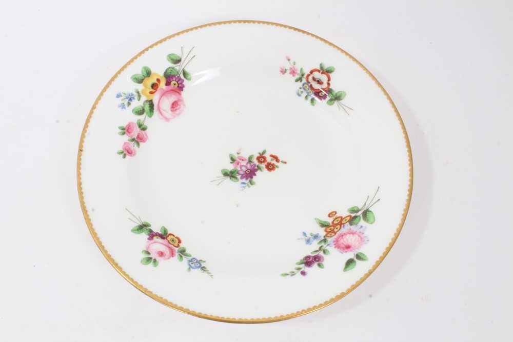 Nantgarw plate, circa 1817-20, polychrome painted with flowers with gilt rim, impressed mark to base