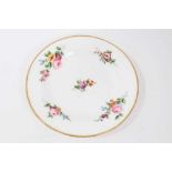 Nantgarw plate, circa 1817-20, polychrome painted with flowers with gilt rim, impressed mark to base