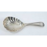 George III silver caddy spoon with shell bowl and engraved armorial crest (London 1803)