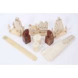 Group of antique ivory to include three processional figures, tow carved soapstone figures and other