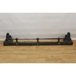 An impressive 19th century steel fire curb of classical form