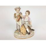 Meissen porcelain group, late 19th century, the boy sat on a sheaf of wheat, listening to a girl pla