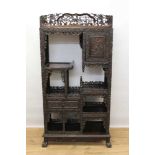 Late 19th century Chinese carved rosewood display cabinet