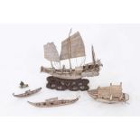 Early 20th century white metal model of an armed Chinese Junk, and other items