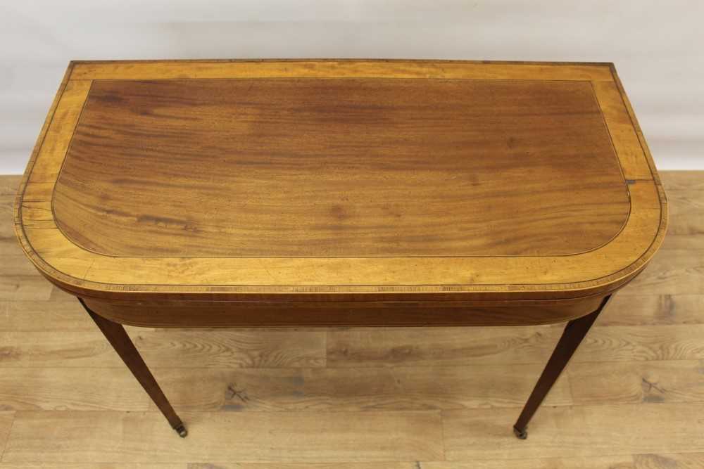 George III mahogany satinwood and tulipwood crossbanded D-shaped card table - Image 2 of 5