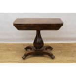 Victorian rosewood card table on shaped pedestal and quatrefoil base