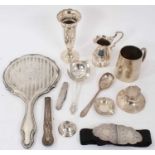 Group of miscellaneous silver items to include nurse's buckle, christening mug and other items