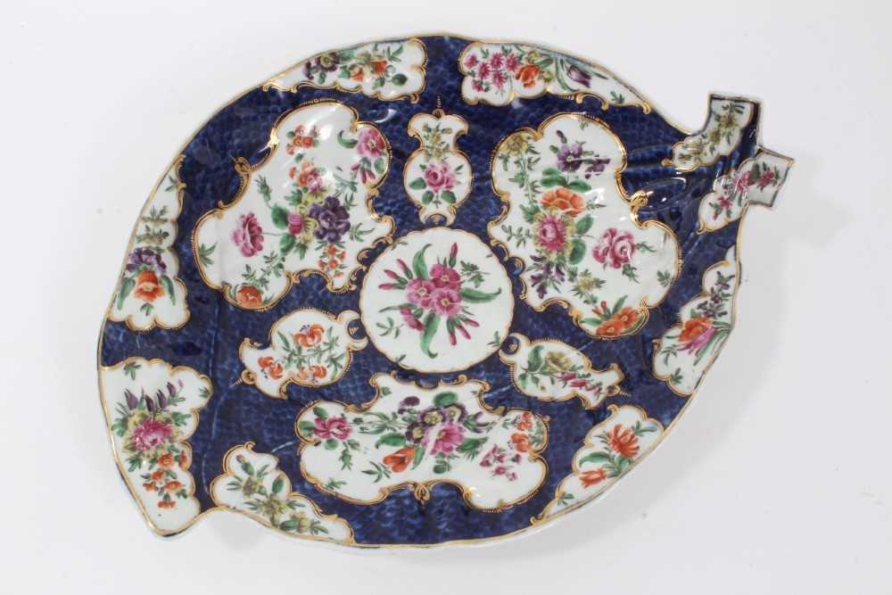 Worcester cabbage leaf dish, circa 1770, painted with panels of flowers with gilt scrollwork borders
