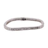 Diamond tennis bracelet with baguette cut diamonds in 18ct white gold setting, estimated total diamo