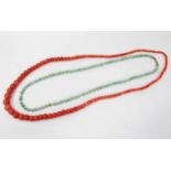 Coral bead necklace with a long string of graduated coral beads measuring approximately 5mm to 14mm,