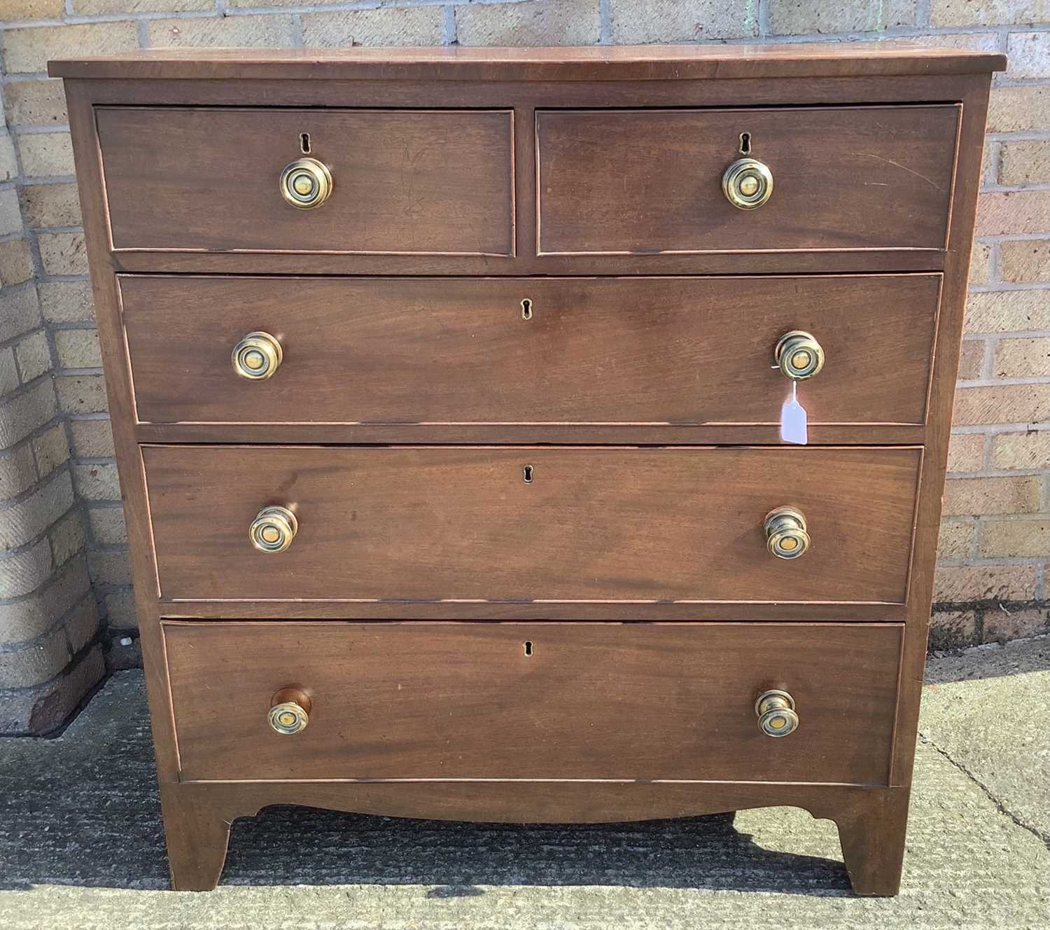 Regency mahogany chest, with four long drawers on bracket feet