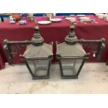 Pair of impressive cast metal lanterns