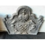 Antique cast iron fire back with heraldic motif