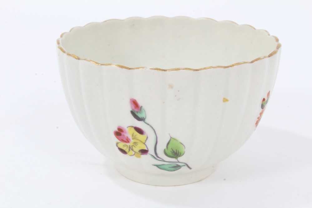 Worcester fluted tea bowl and saucer, circa 1772, polychrome painted with flowers, with gilt rims, t - Image 6 of 8
