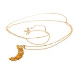 18ct gold and diamond crescent moon pendant with yellow gold wire crescent applied with diamond-set