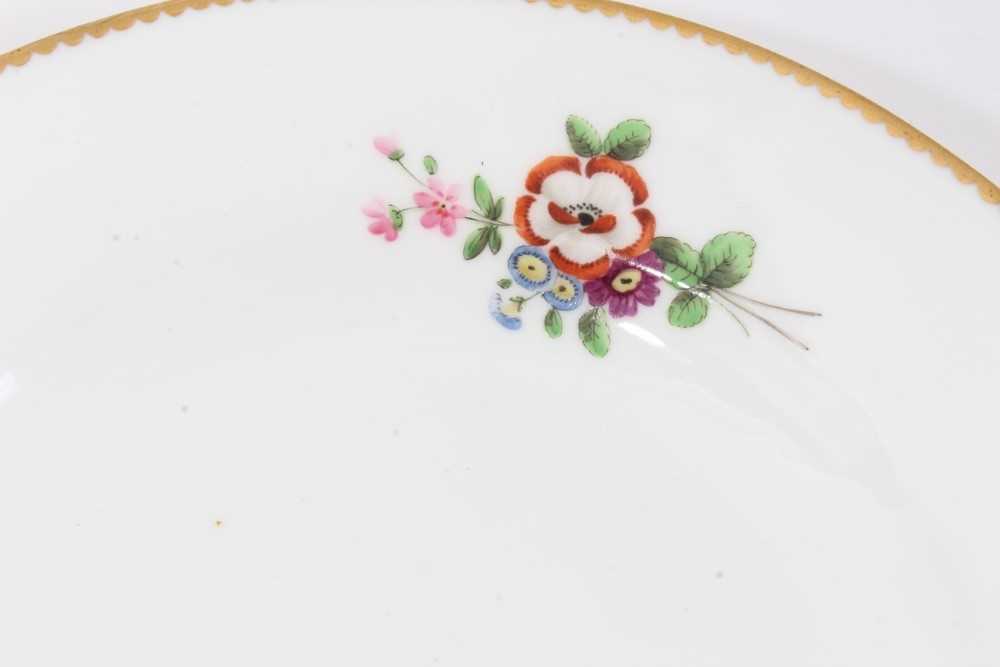 Nantgarw plate, circa 1817-20, polychrome painted with flowers with gilt rim, impressed mark to base - Image 3 of 6
