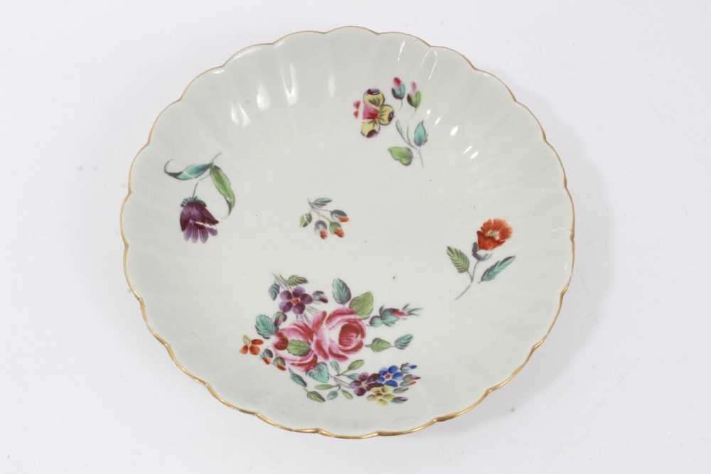 Worcester fluted tea bowl and saucer, circa 1772, polychrome painted with flowers, with gilt rims, t - Image 2 of 8