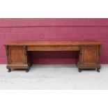 Very large late Regency pollard oak sideboard