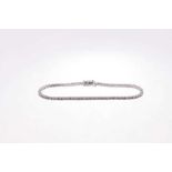 Diamond tennis bracelet with a line of brilliant cut diamonds in 18ct white gold setting. Estimated