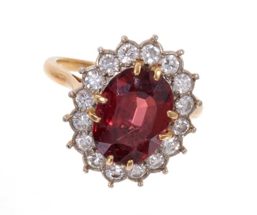 Diamond and garnet cluster ring