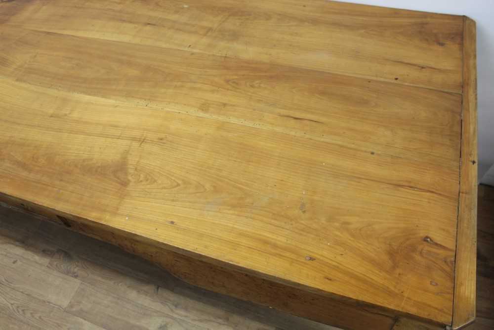 19th century French fruitwood farmhouse table, canted rectangular plank top over end deep drawers an - Image 4 of 5