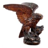 Exceptional late 19th / early 20th century Black Forest carved lindenwood figure of an eagle
