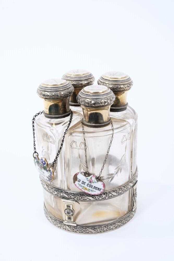 Set of four early 20th century French silver and glass toiletry bottles, with gilded decoration, eac - Image 2 of 2