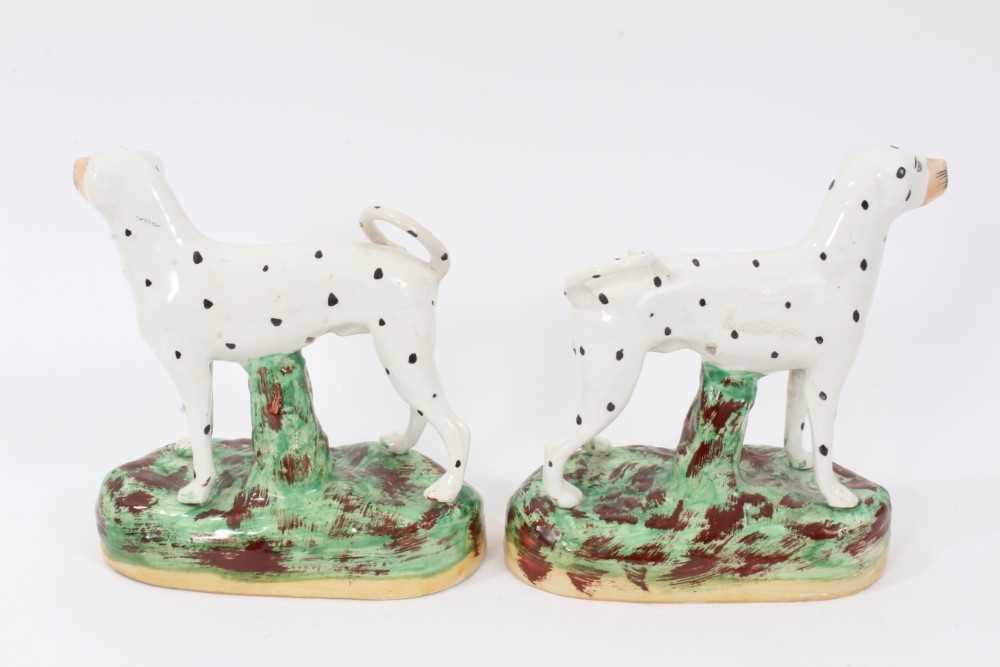 Pair of Staffordshire pottery models of Dalmatians, shown standing on naturalistic bases, 16cm high - Image 2 of 5