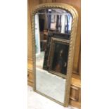 Victorian gilt gesso arched mirror, with rope twist frame, 147 x 70cm