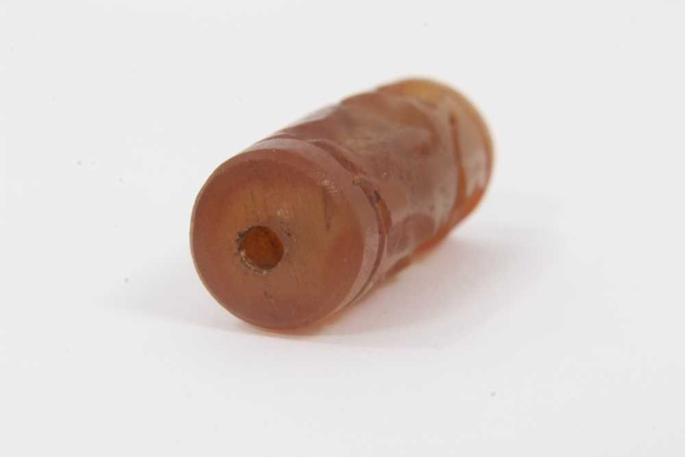 Ancient carved carnelian cylinder seal, Near Middle East, carved with figures, approximately 3.5cm l - Image 4 of 8