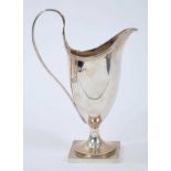 Victorian silver helmut cream jug, with reeded loop handle, on a square base