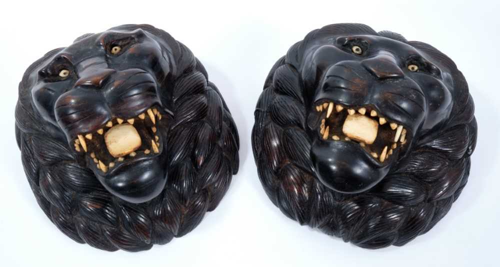 Pair of Indian carved wooden lion's heads with bone eyes, teeth and tongue - Image 2 of 5