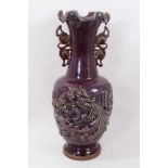 Large 20th century Chinese flambé vase with dragon decoration in relief