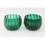 Pair of green glass finger bowls, early 19th century, of moulded round shape with polished pontil ma