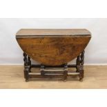 17th century style oak drop leaf table, elliptical hinged top on barley twist and block understructu