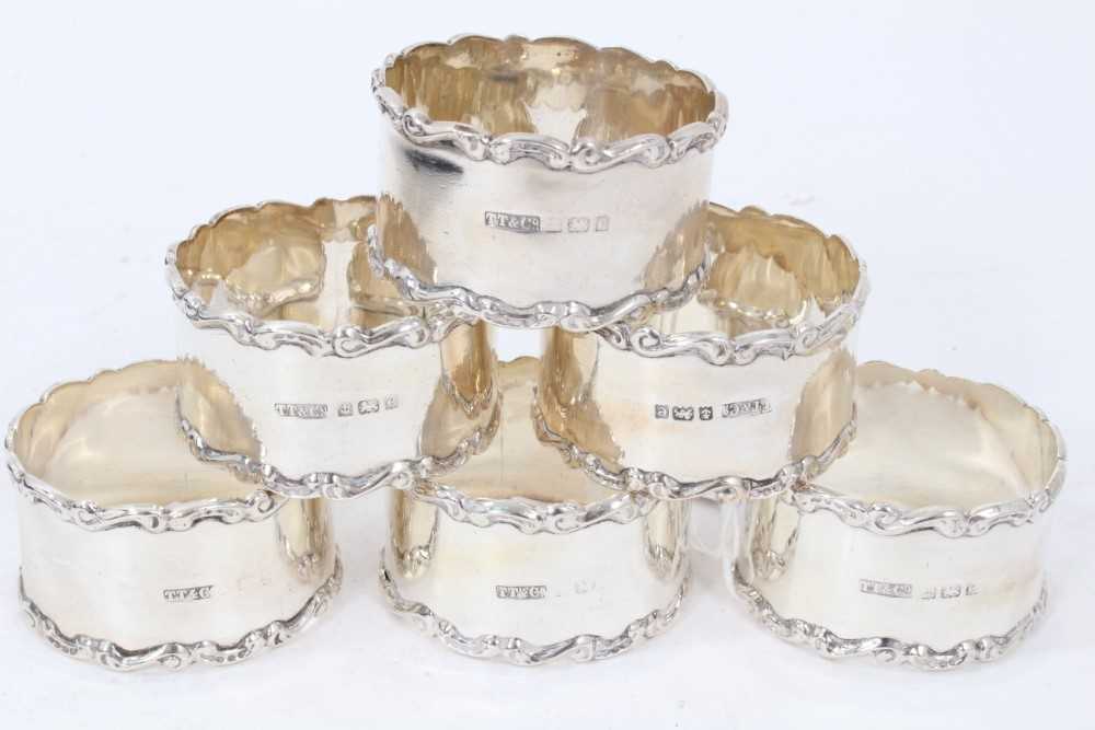 Set of six Edwardian silver napkin rings, with scroll borders and engraved 1- 6, - Image 2 of 3