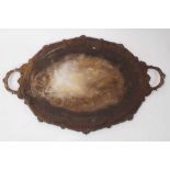 Large Victorian silver tray of shaped oval form, with stylised shell and gadrooned border,