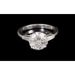 Fine diamond single stone ring with a brilliant cut diamond estimated to weigh approximately 2.95-3c