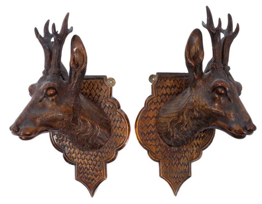 Pair of late 19th / early 20th century carved Black Forest deer trophy heads