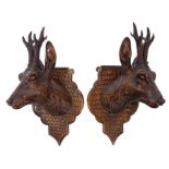 Pair of late 19th / early 20th century carved Black Forest deer trophy heads