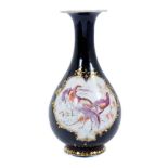 Chelsea bottle vase, circa 1760, decorated with exotic birds on a cobalt blue and gilt-patterned gro