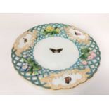 Minton cabinet plate, finely painted with butterflies, the pierced border with floral decoration in