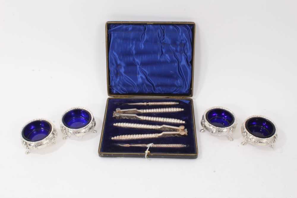 Set of four Victorian silver salts and a cased set of steel nutcrackers