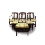 Set of eleven George III style mahogany dining chairs, each with vertical bar back and striped uphol