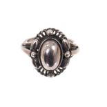 Georg Jensen silver ‘moonlight blossom’ dress ring with an cabochon silver centre in silver setting