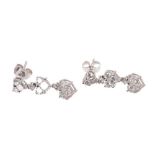 Pair of diamond pendant earrings with heart shape clusters