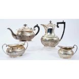 Silver three piece tea set with half fluted decoration, together with a silver plated coffee pot