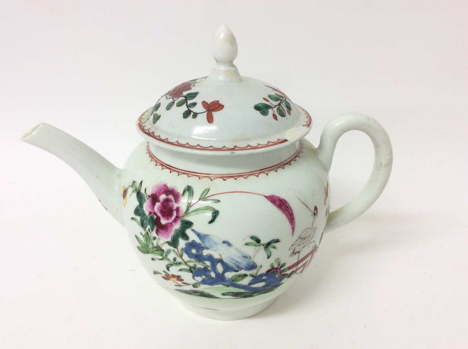 Liverpool teapot and cover, circa 1770, decorated in the famille rose style with a crane in a garden