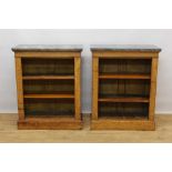 Pair of 19th century satinwood open bookcases with grey marble tops and adjustable shelves